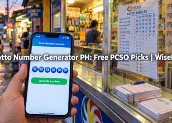 A hand holding a smartphone with a lotto number generator showing six blue number balls at a PCSO lotto outlet counter in the Philippines.