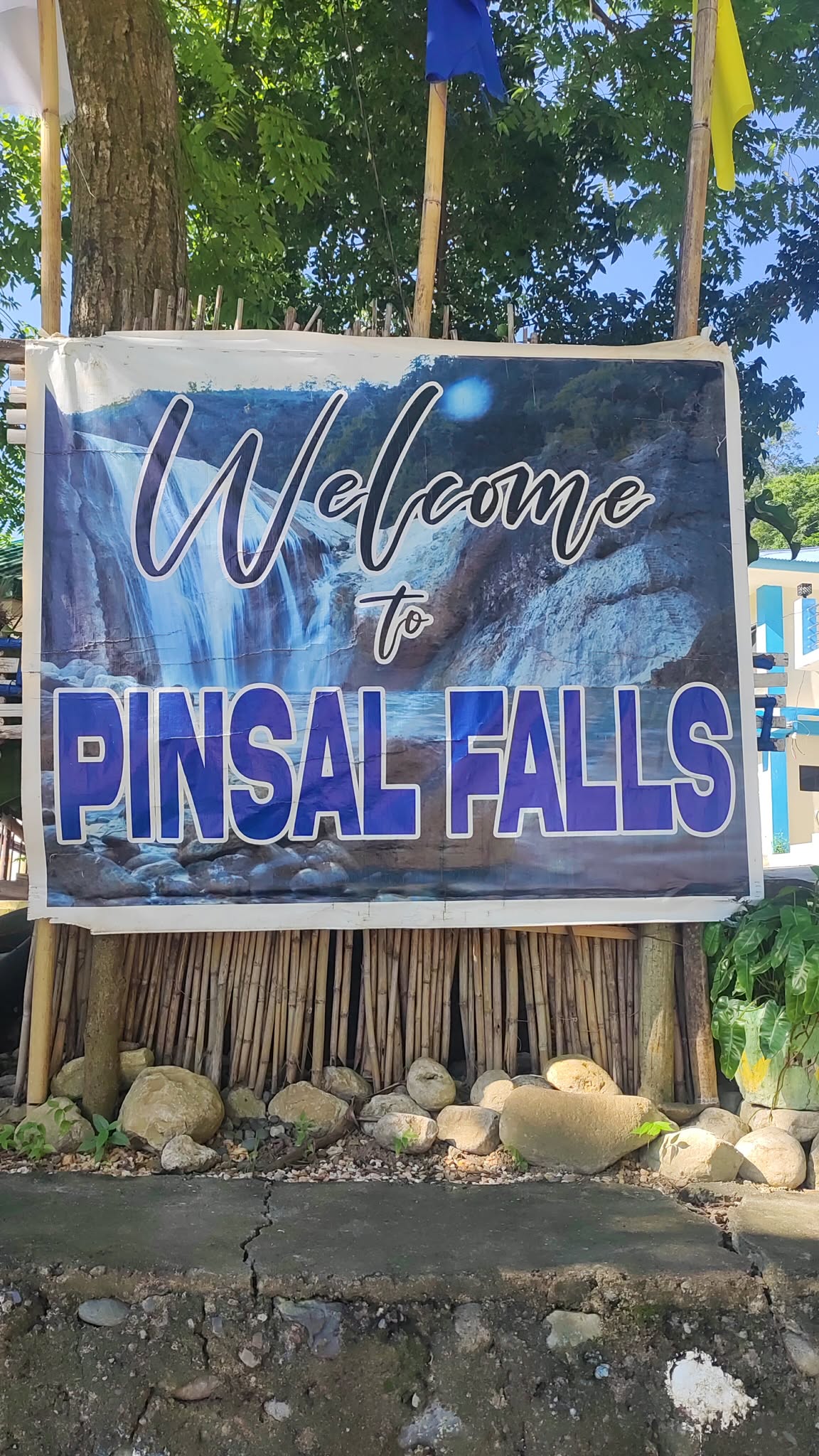 Pinsal Falls Ilocos Sur full view showing waterfall and surrounding greenery