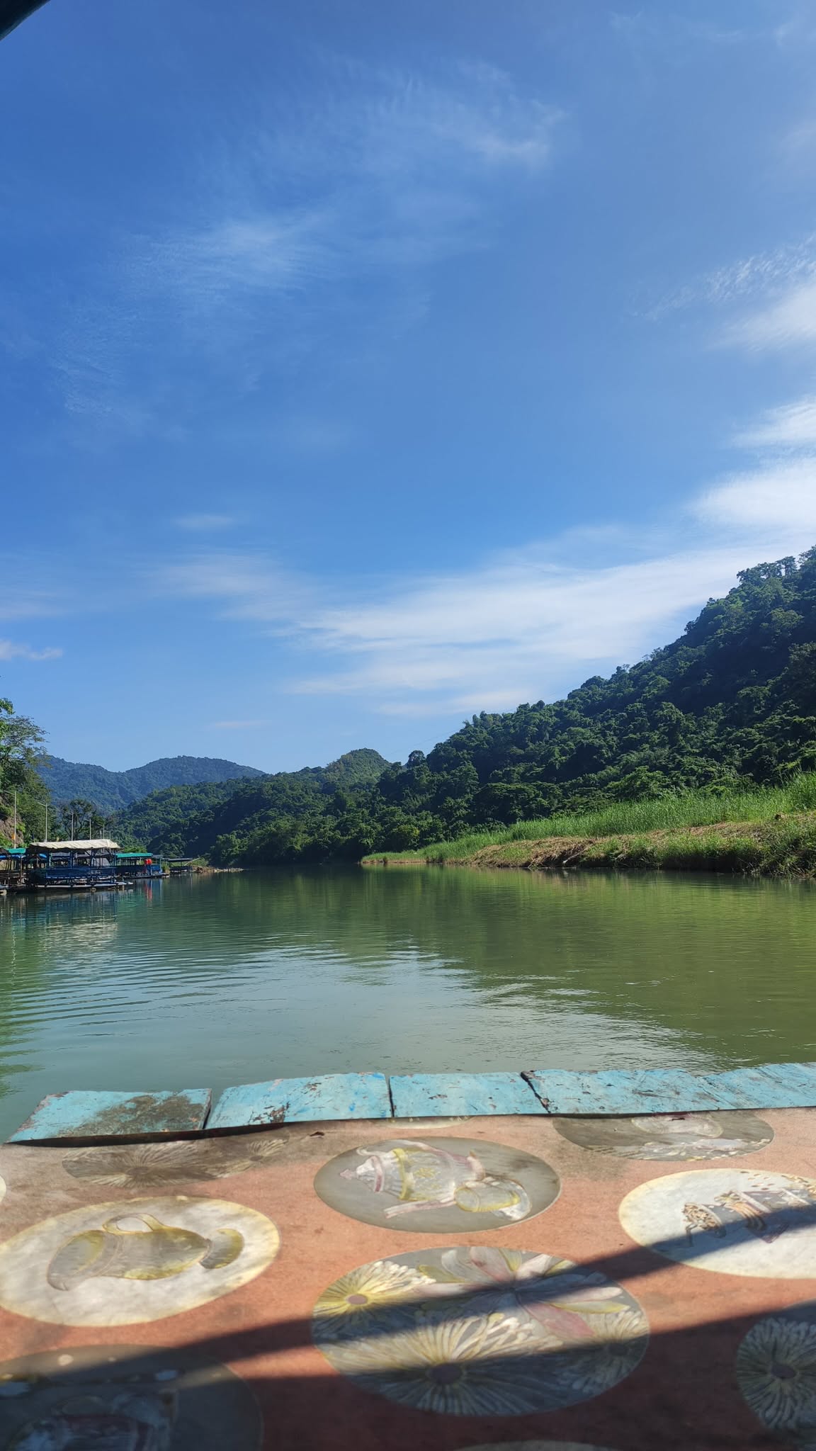 View of Pinsal Falls from the upper view deck showing cascades and green pools