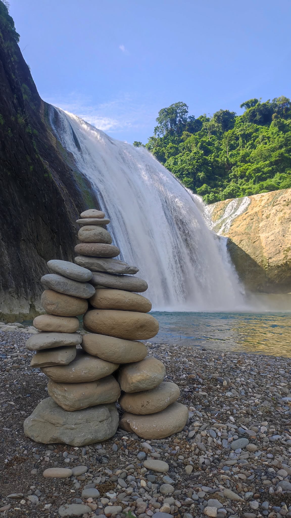 Visitors at the view deck of Pinsal Falls Ilocos Sur overlooking the waterfall