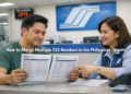 Filipino man at SSS branch comparing two contribution history printouts during SSS number consolidation process