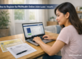Young Filipino woman registering for PhilHealth online at home using a laptop
