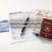 A flat-lay of a Philippine Postal ID card surrounded by application requirements including a printed form, utility bill, and valid IDs, illustrating the step-by-step process of how to apply for a Postal ID in the Philippines.