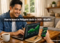 Filipino man learning how to invest in Philippine stock market on laptop at home: WisePH beginner's guide 2026