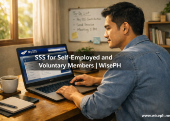 A Filipino business owner reviews his SSS contribution record on a laptop in his home office, representing the SSS guide for self-employed and voluntary members.