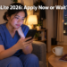 A Filipino OFW healthcare worker reviews the SSS LoanLite microloan application on her phone in her apartment abroad.