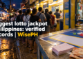 A long night queue stretches from a small lotto outlet onto the sidewalk, with a jackpot poster and lotto tickets on the counter.